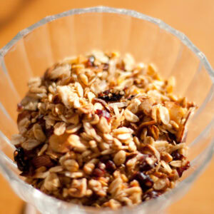 a glass dish with granola inside.