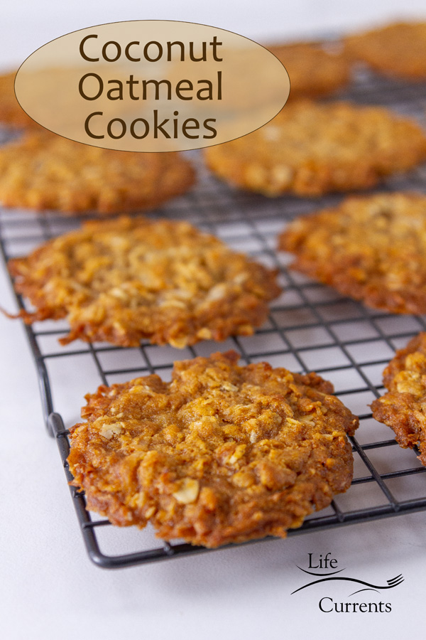 cookies on a wire rack, title in upper left of image: Coconut Oat Cookies.
