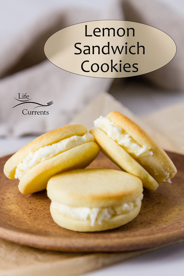 Lemon Sandwich Cookies: title on image. 3 cookies stacked on a brown plate 