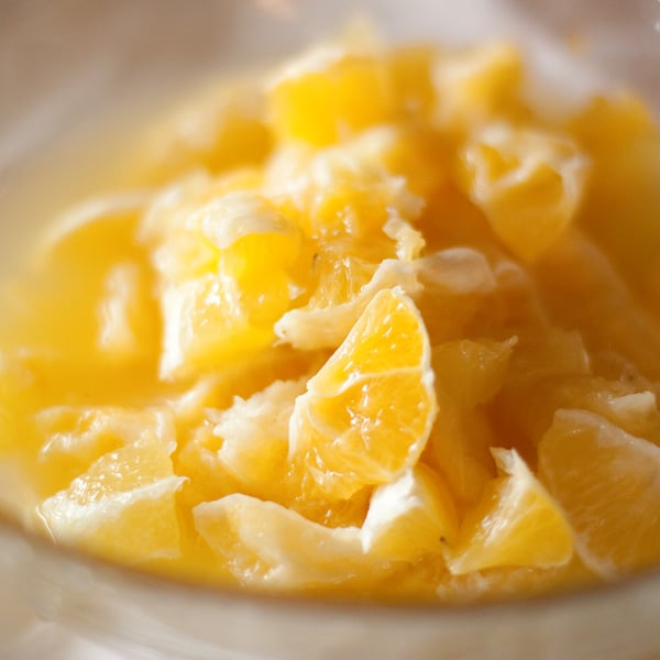 lemons that have had the skins and pith removed in a bowl.
