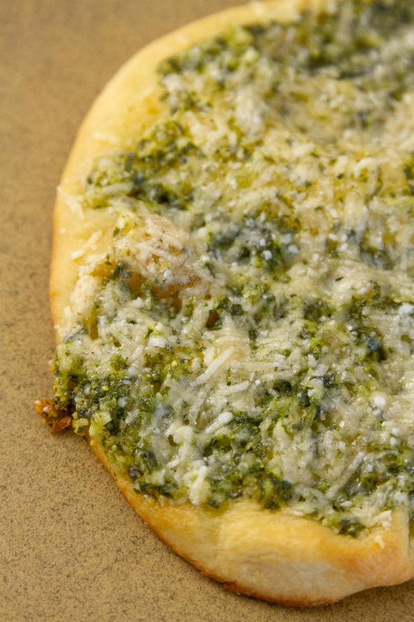 pizza made with basil pesto.