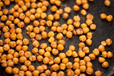 chickpeas on a black background.