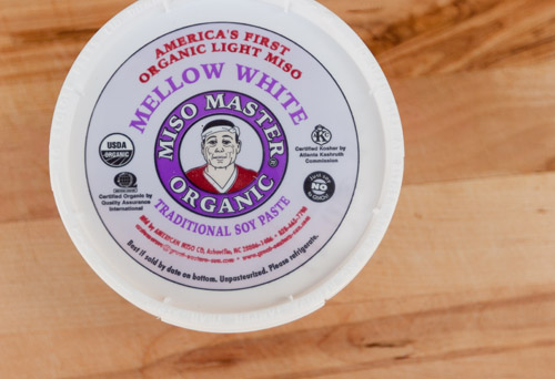 Miso Tahini Pasta with Garlic Sautéed Mushrooms miso paste in a container.