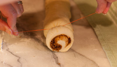 cinnamon rolls with vanilla icing: Cinnamon Rolls, a tutorial for rolling and cutting https://lifecurrentsblog.com #tutorial #howto #cinnamon #breakfast