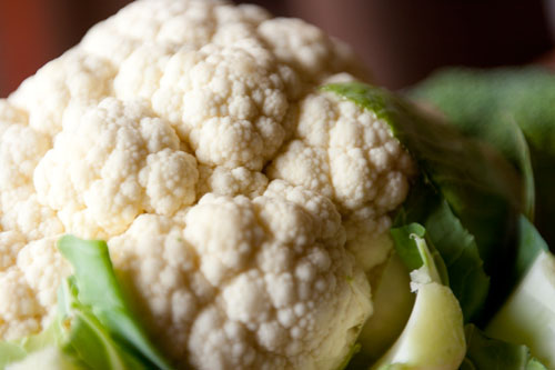 Red wine pasta with Roasted Cauliflower and Broccoli Topped with Pine Nuts and Grated Parmesan