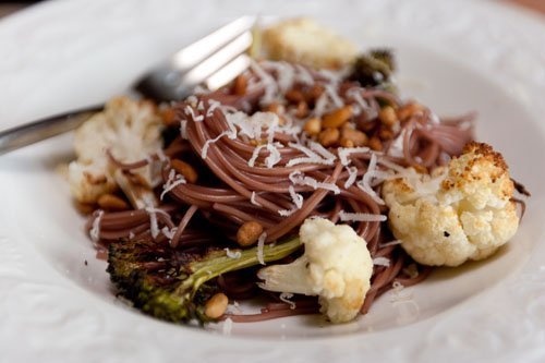 Red wine pasta with Roasted Cauliflower and Broccoli Topped with Pine Nuts and Grated Parmesan Red wine pasta with Roasted Cauliflower and Broccoli Topped with Pine Nuts and Grated Parmesan