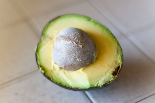 the reed avocado that's been cut open.