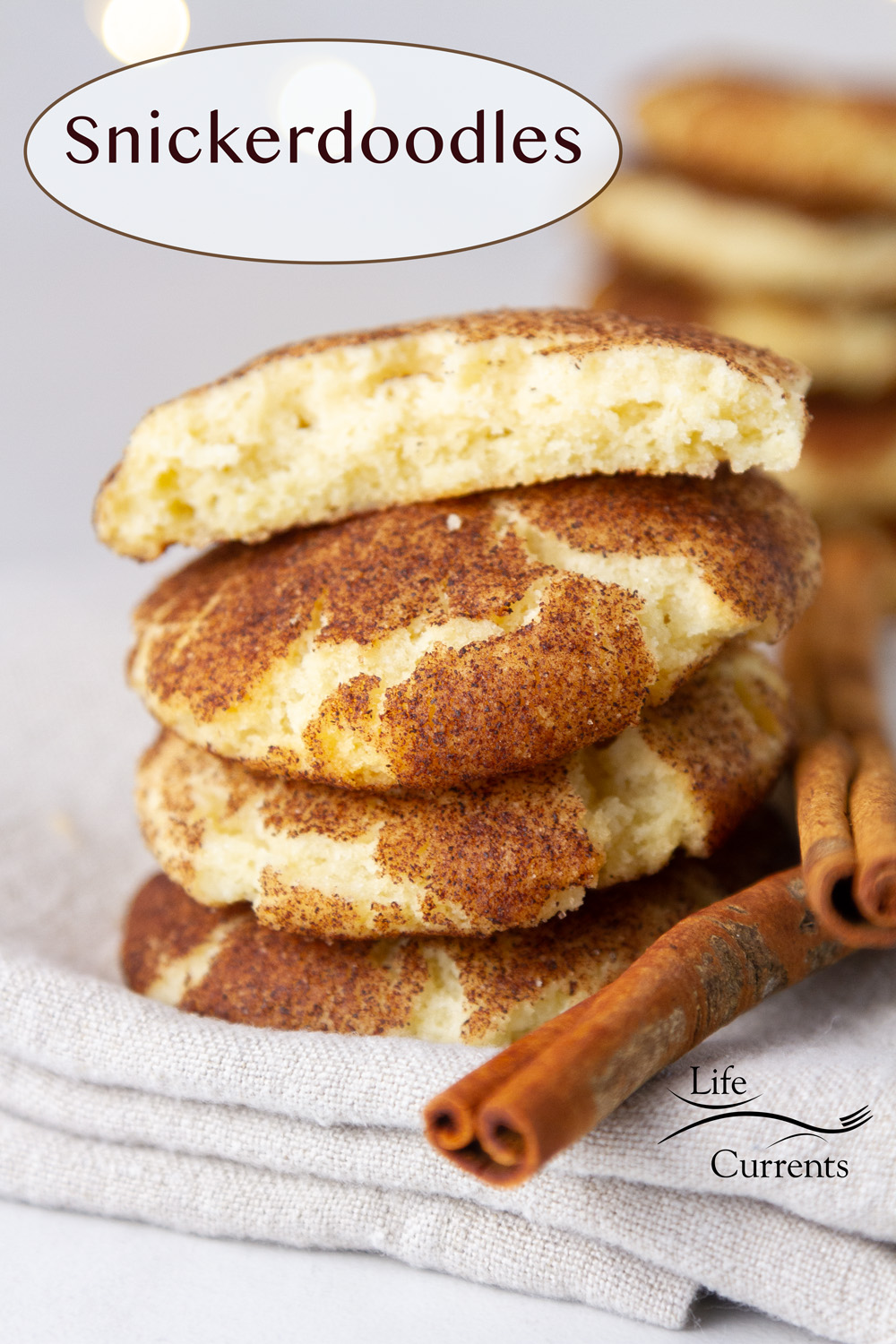 cookies stacked up on top of eachother with some cinnamon sticks.