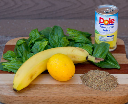 the ingredients, spinach, banana, lemon, flaxseed, pineapple juice: There are many versions of the Green Monster Smoothie out there; this is mine: it's vegan, gluten-free, grain-free, and yummy. I love this drink both because it&rsquo;s uber-healthy, and because it&rsquo;s super-delish. 