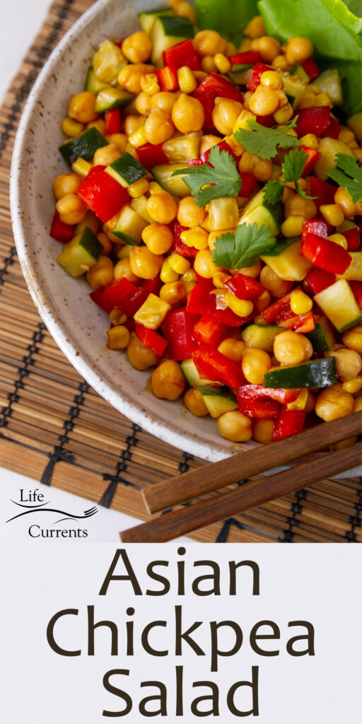 top down view of a chopped salad in a white bowl with chopsticks, title on bottom of image.