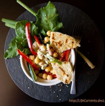 deconstructed hummus salad with tahini dressing and flatbread croutons