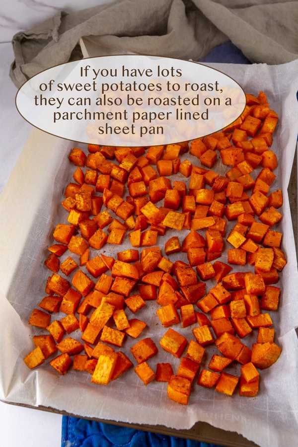 roasted sweet potatoes on a sheet pan.