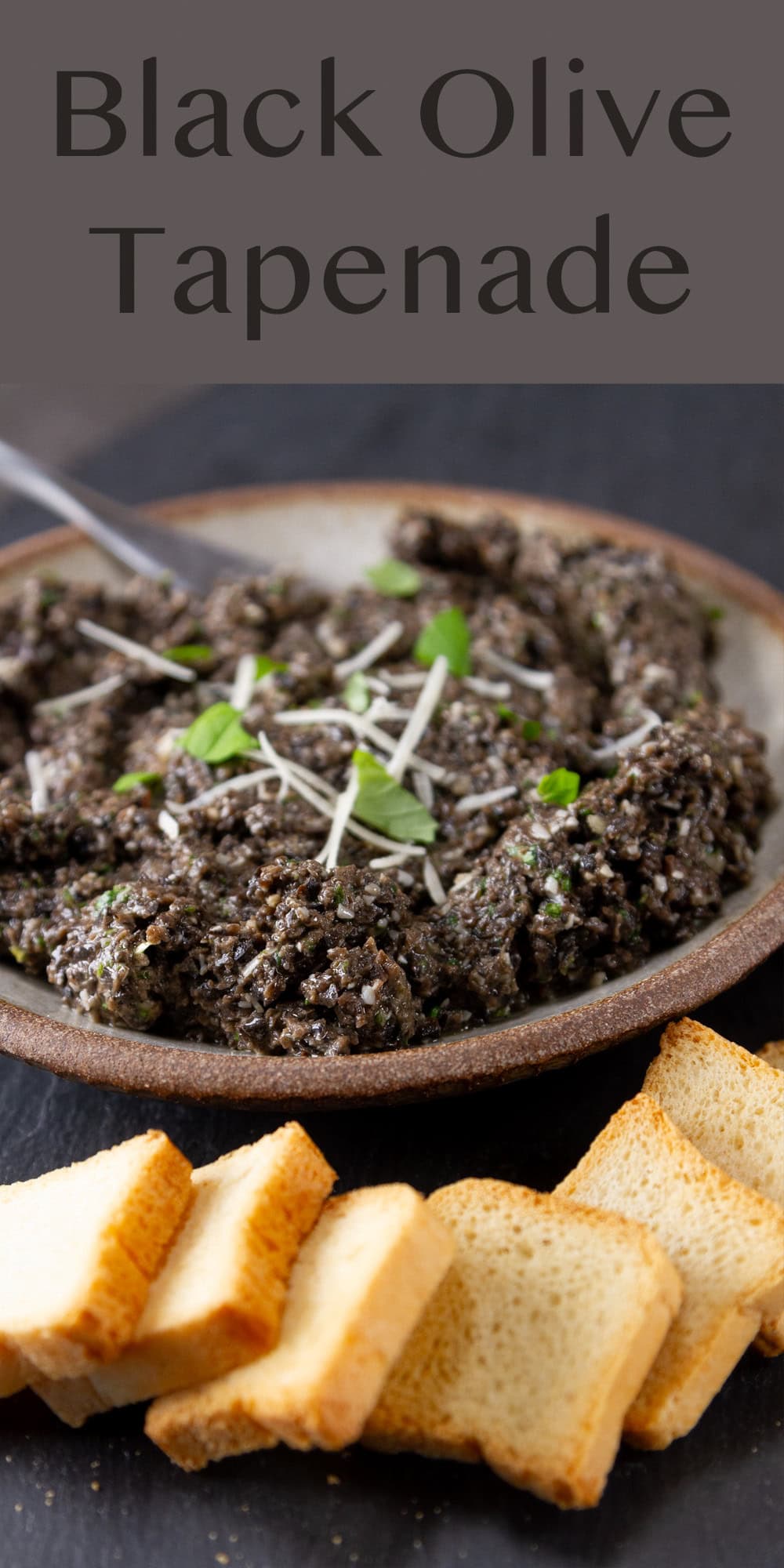 a bowl of appetizer spread with crackers.