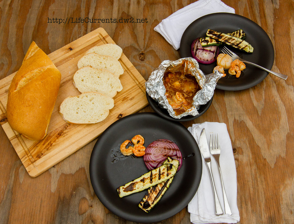 Shrimp and Scallop Boil in Foil Packets | Life Currents Shrimp and Scallop Boil in Foil Packets | Life Currents https://lifecurrentsblog.com This Shrimp and Scallop Boil in Foil Packets is something we've been playing around with all summer. It makes an easy going dinner party that everyone loves! #seafood #grill #foilPacket