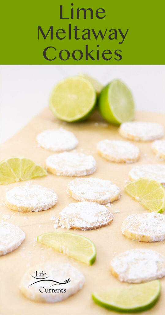 a tray full of cookies with slices of lime, title on top: Lime Meltaway Cookies.