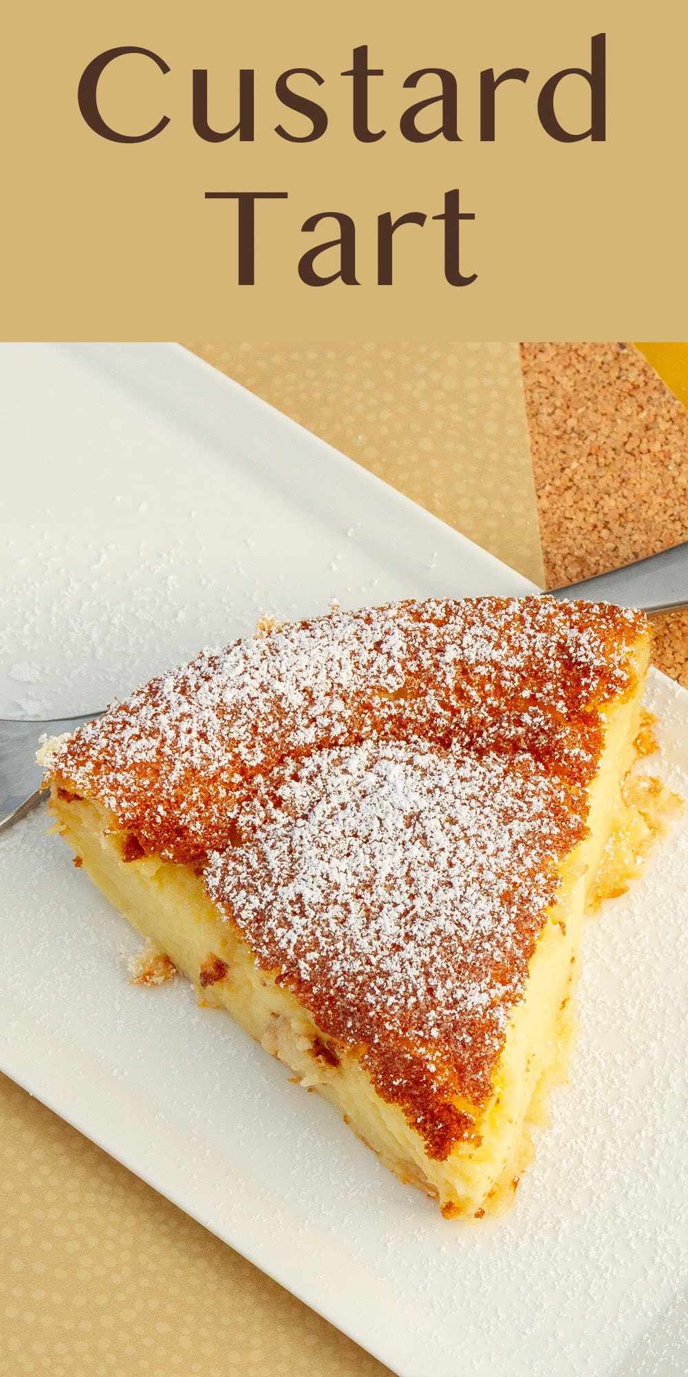 looking down on a slice of tart with a fork next to it.