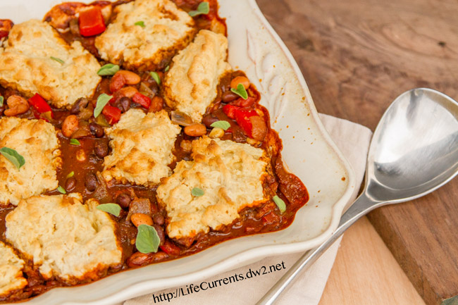 casserole in a dish with a serving spoon.