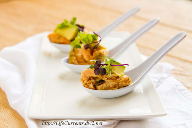 Island Jalapeno Albacore Tuna Poke on Baked Won Ton Wrappers by Life Currents spoons full of tuna, avocado, and microgreens.