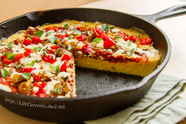 polenta pizza in a cast iron skillet.