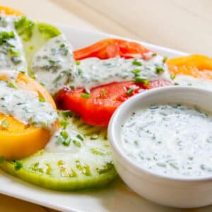 ranch dressing over tomato slices.