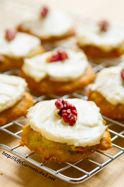 Zucchini Cookies with Cream Cheese Frosting are filling with yummy ingredients like walnuts, coconut, and zucchini. Have them for a snack or even for breakfast! by Life Currents https://LifeCurrents.dw2.net