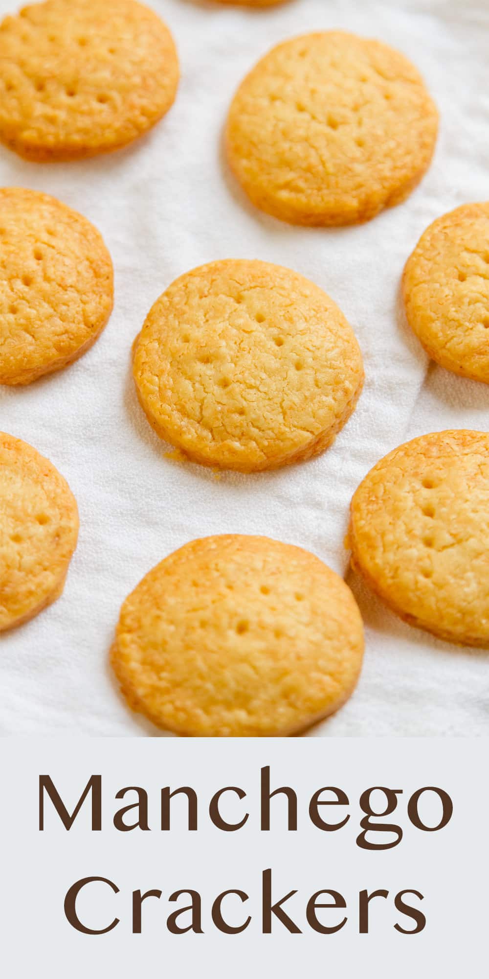 several crackers laid out on a white cloth.