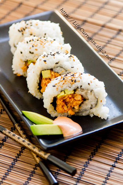 Island Trollers Spicy Tuna Roll, the inside out version. I love making my own sushi at home; it's delicious, better for your budget, and fun! https://lifecurrentsblog.com