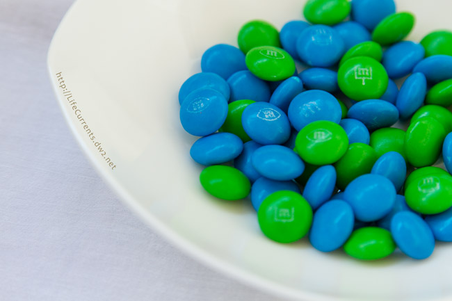 Football Party Dessert Spread including Pie Crust Cookies with M&M'S® Brand Milk / Peanut Chocolate Candies Game Day Mix - this is the perfect easy way to entertain during football season blue and green M&Ms in a dish.