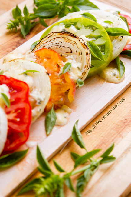 Plank Grilled Blue Cheese Caprese is a fun way to enjoy Caprese as an appetizer or a salad. The combination of sweet tomatoes, savory melted blue cheese, and smoky grilled onions is simply divine! 
