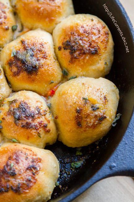 These Skillet Pizza Bombs are so much fun! Soft rolls of pizza dough surrounding your favorite pizza fillings, baked to pizza-goodness, and topped with garlic herb butter. Yum! These didn't last long in our house, that's for sure! 