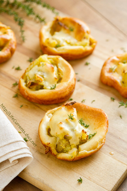 Savory Mashed Potato Puffs - Baked breads stuffed with thyme mashed potatoes are a great side dish and a fiun way to use leftover mashed potatoes 