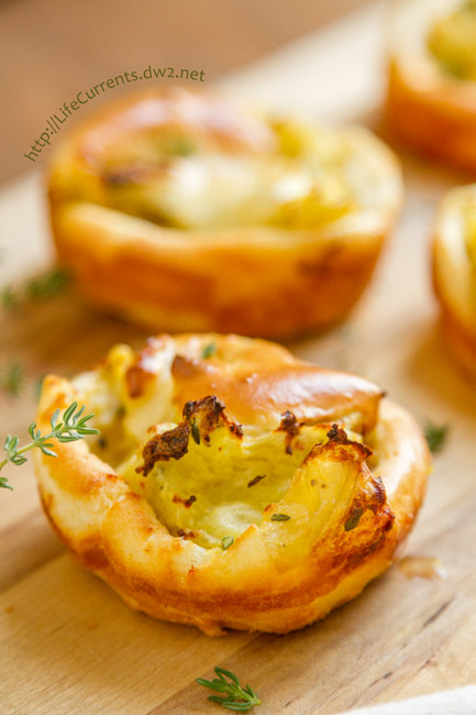 Savory Mashed Potato Puffs - Baked breads stuffed with thyme mashed potatoes are a great side dish and a fiun way to use leftover mashed potatoes 