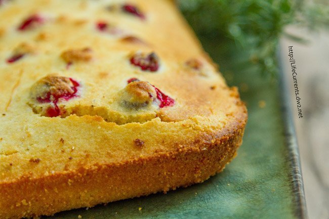 Cranberry Rosemary Cornbread - sweet old-fashioned cornbread with tart cranberries mixed in, and a little earthy rosemary to top it all off - the perfect festive and delicious side dish at the holidays