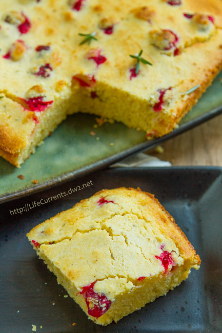 Cranberry Rosemary Cornbread - sweet old-fashioned cornbread with tart cranberries mixed in, and a little earthy rosemary to top it all off - the perfect festive and delicious side dish at the holidays