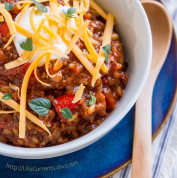 This Slow Cooker Mexican Bean and Brown Rice Stew is great comfort food. It warms you from the inside, and it smells terrific while it cooks in the crock pot. It’s also fun to let your family garnish each bowl however the want – cheese, sour cream, crushed tortilla chips, fresh herbs, avocado, whatever suits your fancy.