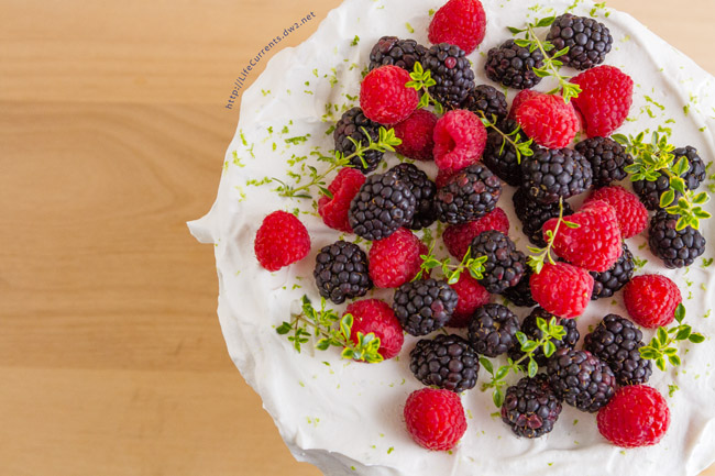 Fragrant Jasmine Rice Cake - pretty gluten-free celebration cake with its fragrant cardamom and lime scented rice pudding insides all crowned with lime whipped cream and fresh berries - the perfect dessert or breakfast 