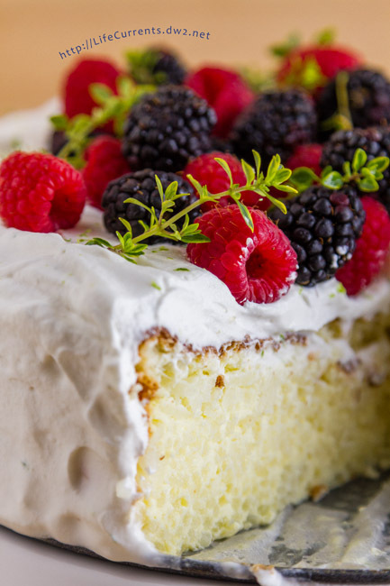 Fragrant Jasmine Rice Cake - pretty gluten-free celebration cake with its fragrant cardamom and lime scented rice pudding insides all crowned with lime whipped cream and fresh berries - the perfect dessert or breakfast