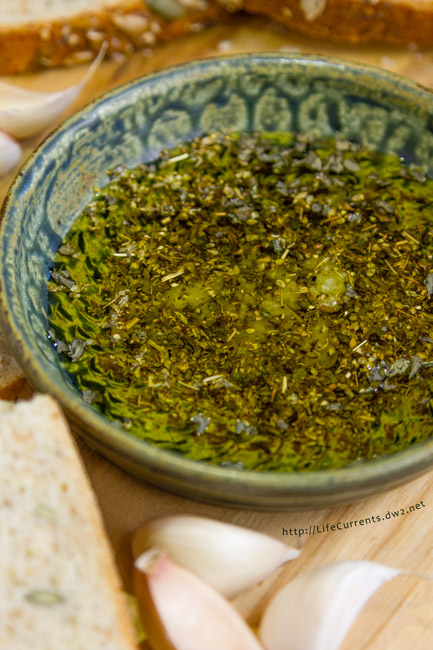 Garlic Dipping Oil - a classic combination of lovely dried herbs, fresh garlic, and flavorful olive oil to dip crusty bread in