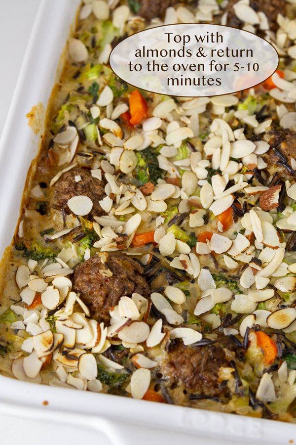 The casserole has been topped with almonds.
