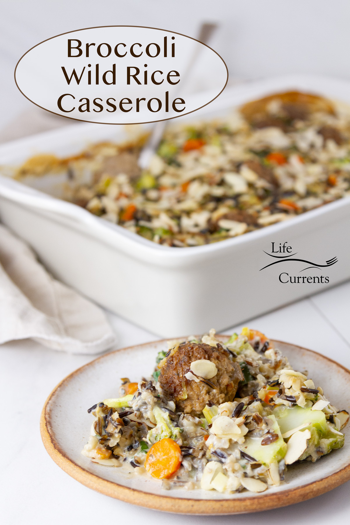 A serving of Broccoli Wild Rice Casserole on a small plate in front of the casserole, title on upper left.