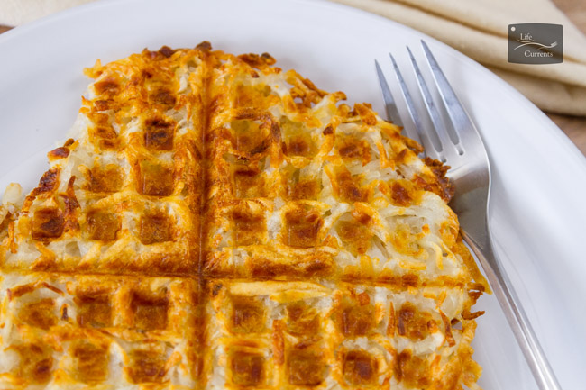 Hash Browns on a plate with a fork