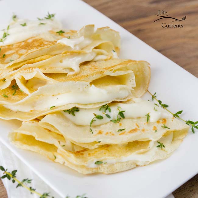 Nothing says French cuisine to me like cheese, butter, wine, and crepes. And this recipe uses all of those elements to bring you an amazingly tasty and fun meal. 