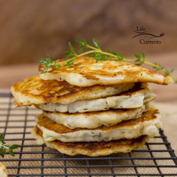 Onion Fritters - All the taste of an onion ring in a simple to make little pancake. Everyone will love these as a side dish or a fancy appetizer.