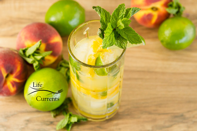 Peach Mojito - refreshing summer fresh peaches, mint and rum beverage Peach Mojito - refreshing summer fresh peaches, mint and rum beverage