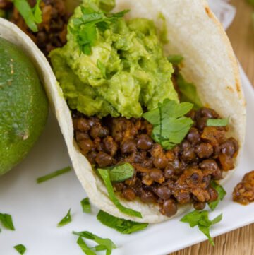 Easy Lentil Tacos with Smashed Avocado - They&rsquo;re super healthy, loaded with good for you protein, fiber, and veggies! These vegan, gluten free tacos will be a family favorite for taco Tuesday, or any day!
