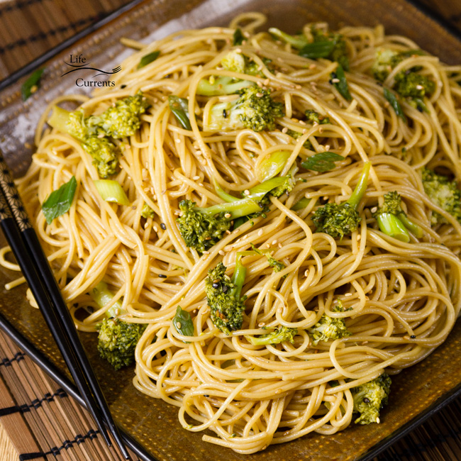 Garlic Sesame Noodles - square image with Asian noodles on a plate with chopsticks