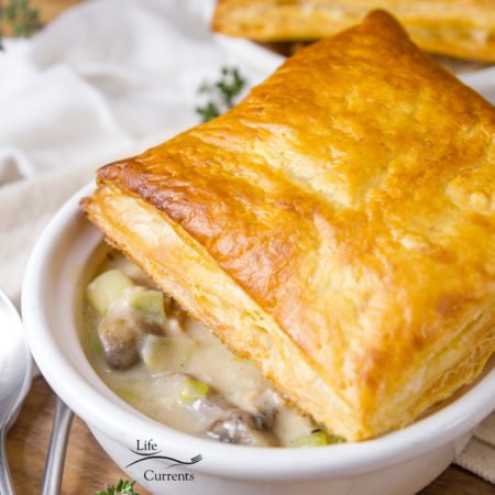 Individual Tuna Mushroom Pot Pies topped with a puff pastry square