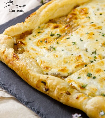 It’s a fancy French Onion Tart dish that you can easily make in your own kitchen, no matter where you live.