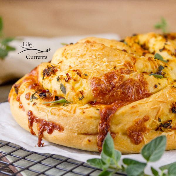 Garlic, Tomato, and Cheese Twisted Yeast Bread a stunningly delicious bread with great flavor and a beautiful shape that&rsquo;s fairly easy to make