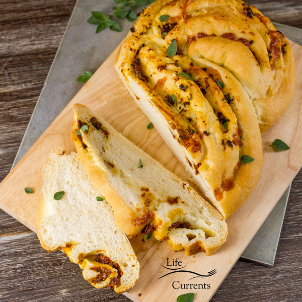 Garlic, Tomato, and Cheese Twisted Yeast Bread has a beautifully soft, fluffy texture with perfect little air pockets in the bread.